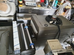 Packer for shrink wrap