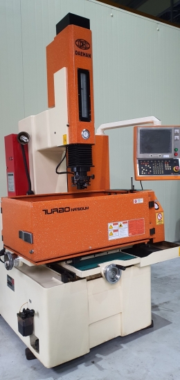 Discharge machining machine