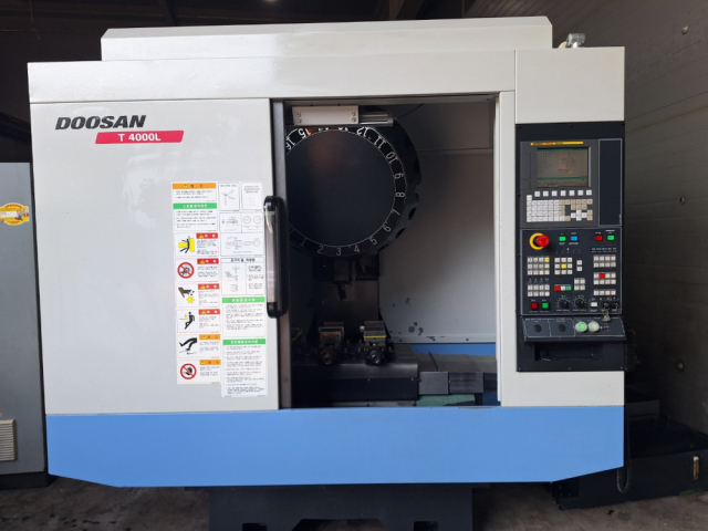 두산 탭핑센터 T4000L/12K 중고탭핑센타