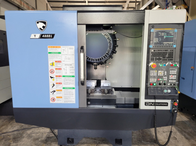 디엔솔루션즈(두산) 탭핑센터 T4000L/12K 중고탭핑센타